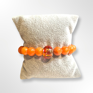 L & J COLLECTION BRACELET: STACKER GLASS SWIRL CHARM (ORANGE)