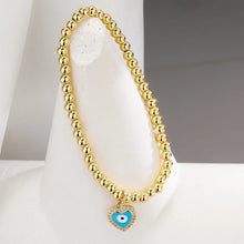 Load image into Gallery viewer, BRACELET: GOLD BEAD HEART EYE
