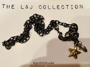 NECKLACE: GUNMETAL CHAIN W STAR & HAND